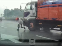 Motorcyclist nearly escapes getting run over by truck, video viral