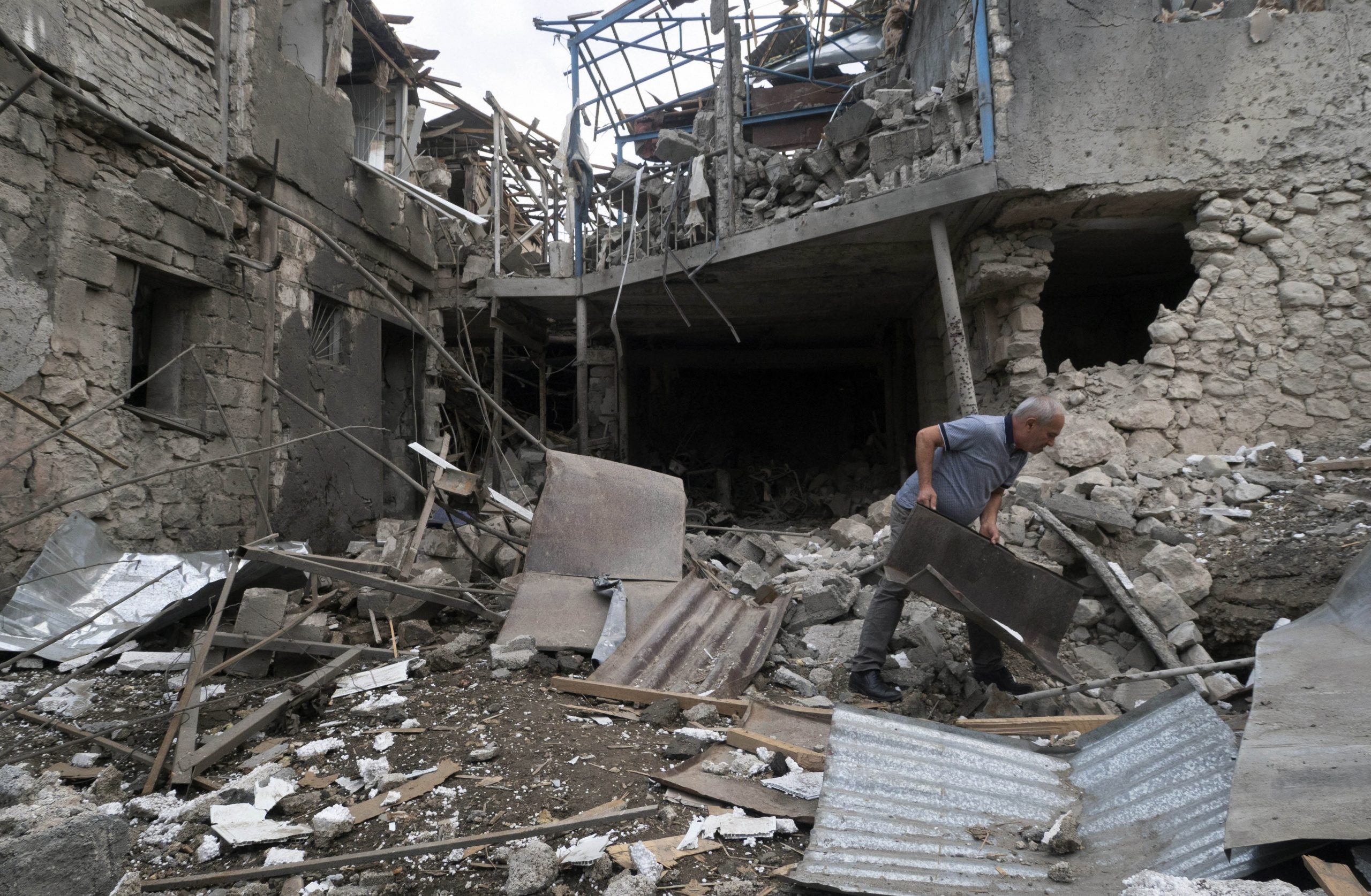 In war-hit Karabakh capital, residents inspect destroyed homes