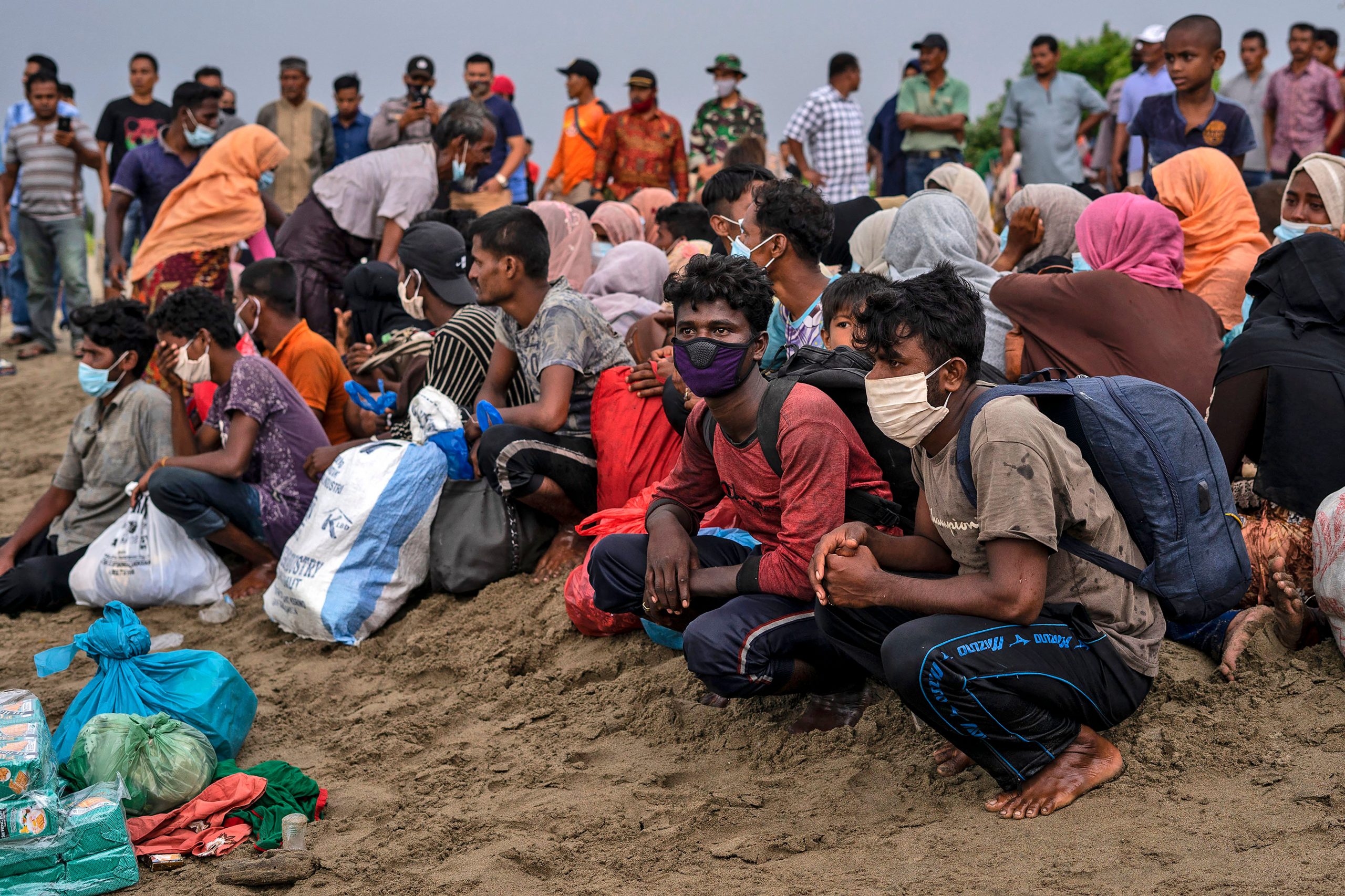 Smugglers beat up Rohingya refugees over quality of food on trafficking boat | Watch