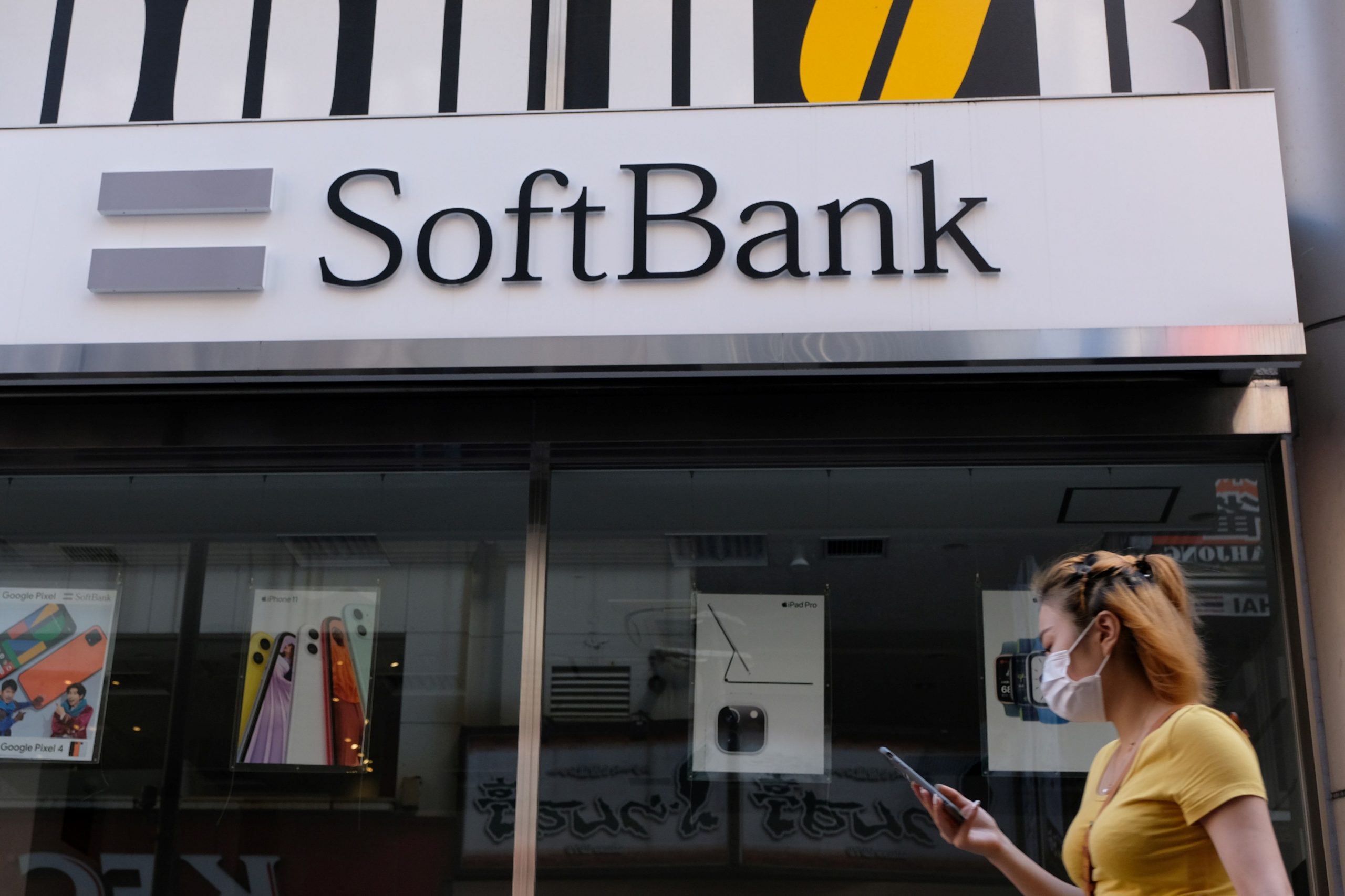 SoftBank reports $12 billion quarterly profit after record loss