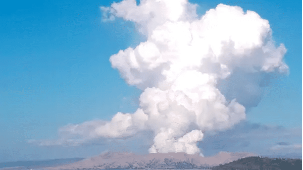 Philippine volcano near capital emits ash and gas