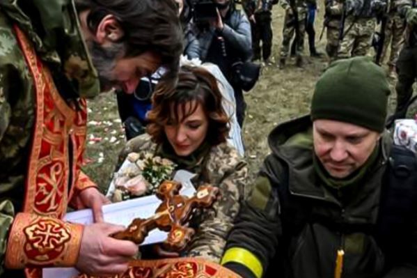 Ukrainian defence force couple marries on front line amid Russia invasion