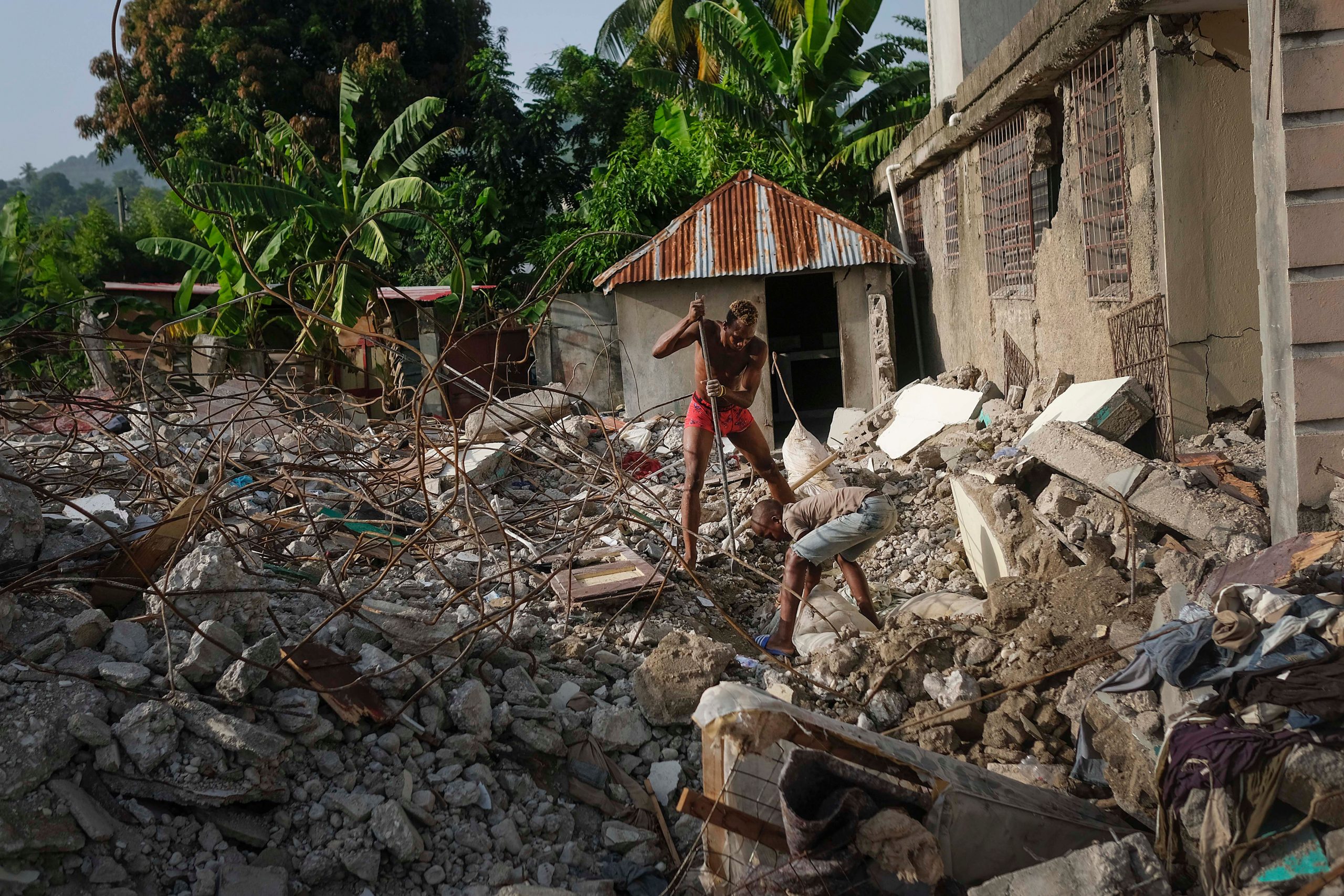 Cleanup begins of Haiti town’s earthquake-crumbled homes
