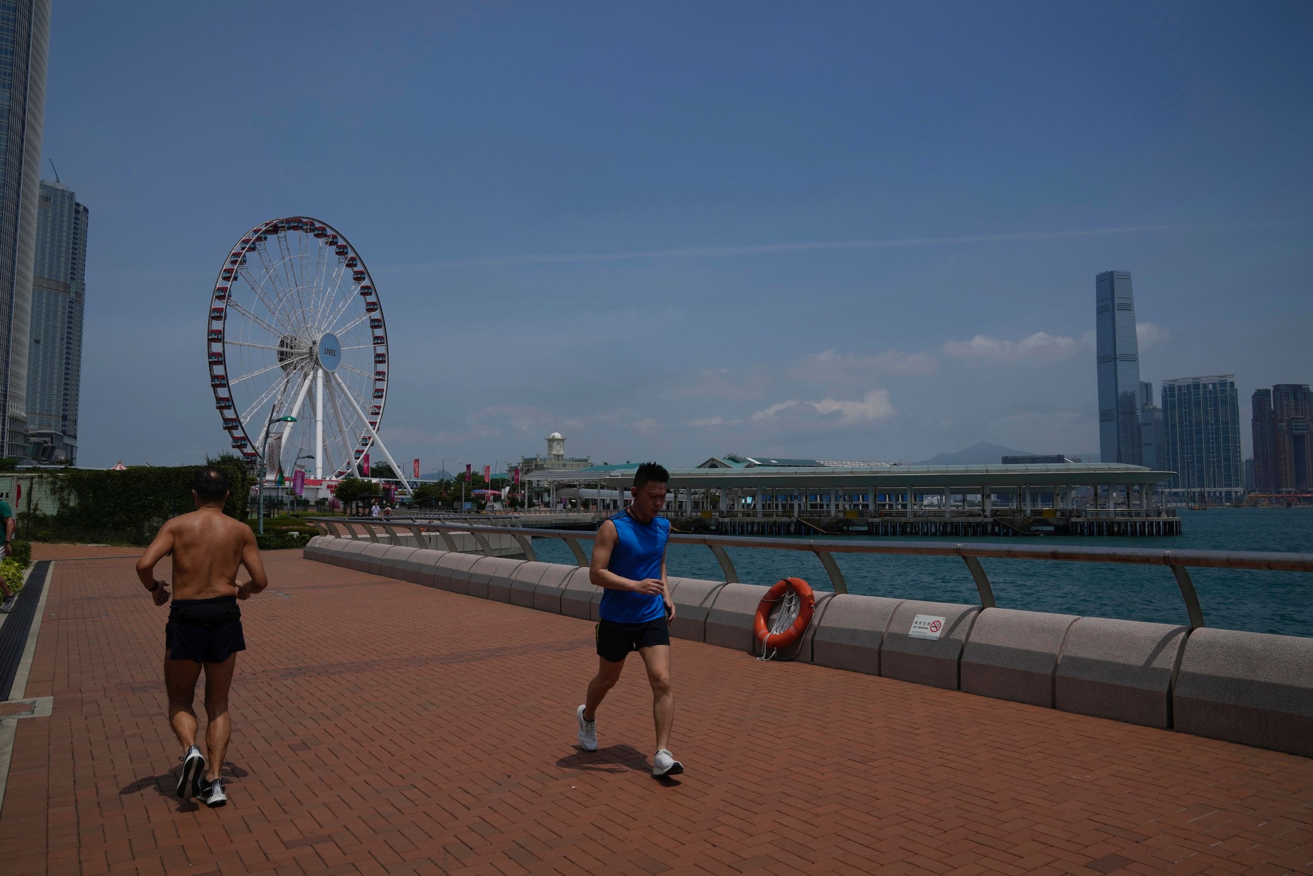 Beijing relaxes quarantine rules as Hong Kong reopens beaches