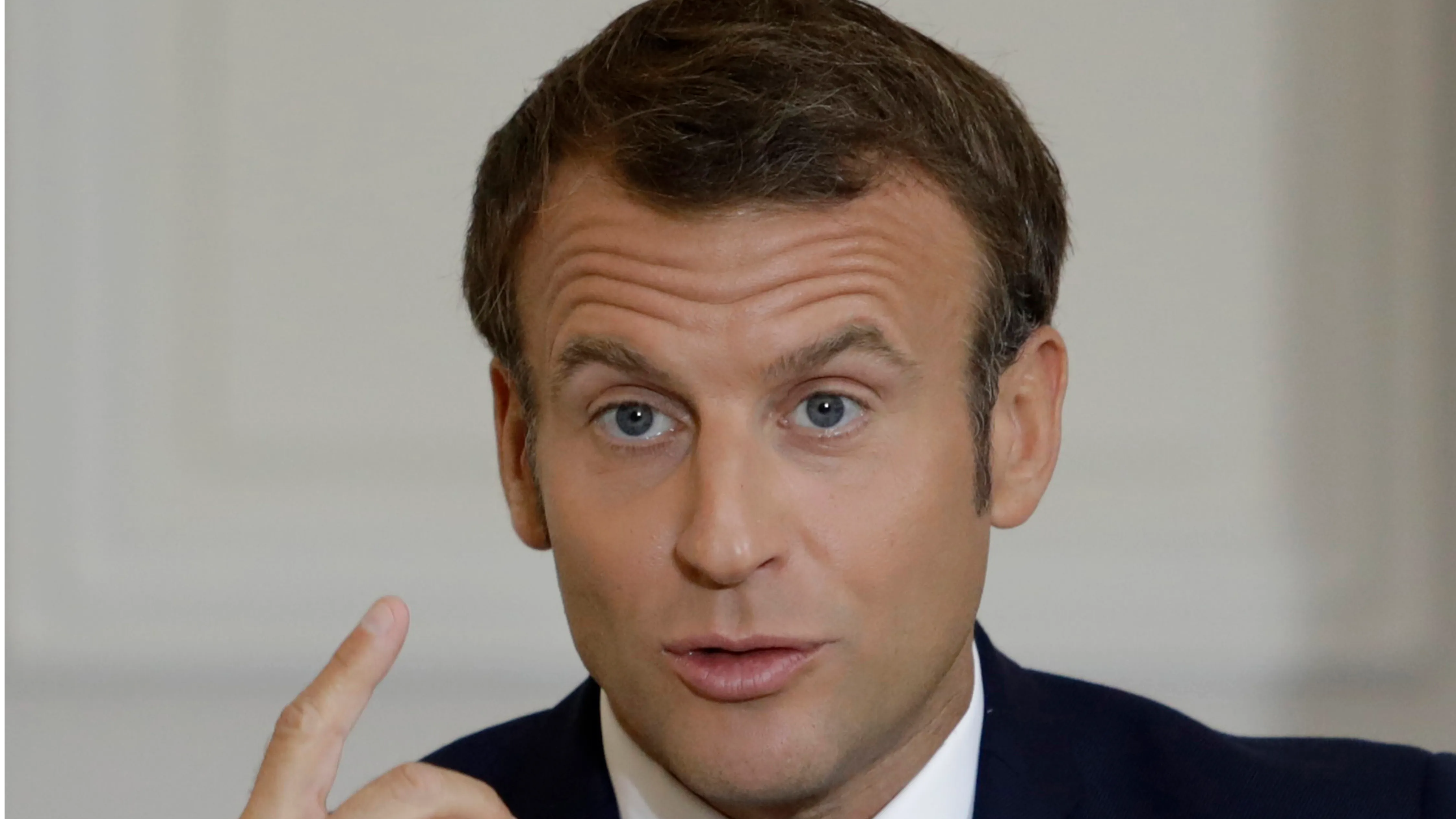 Emmanuel Macron to continue to greet crowd despite being slapped