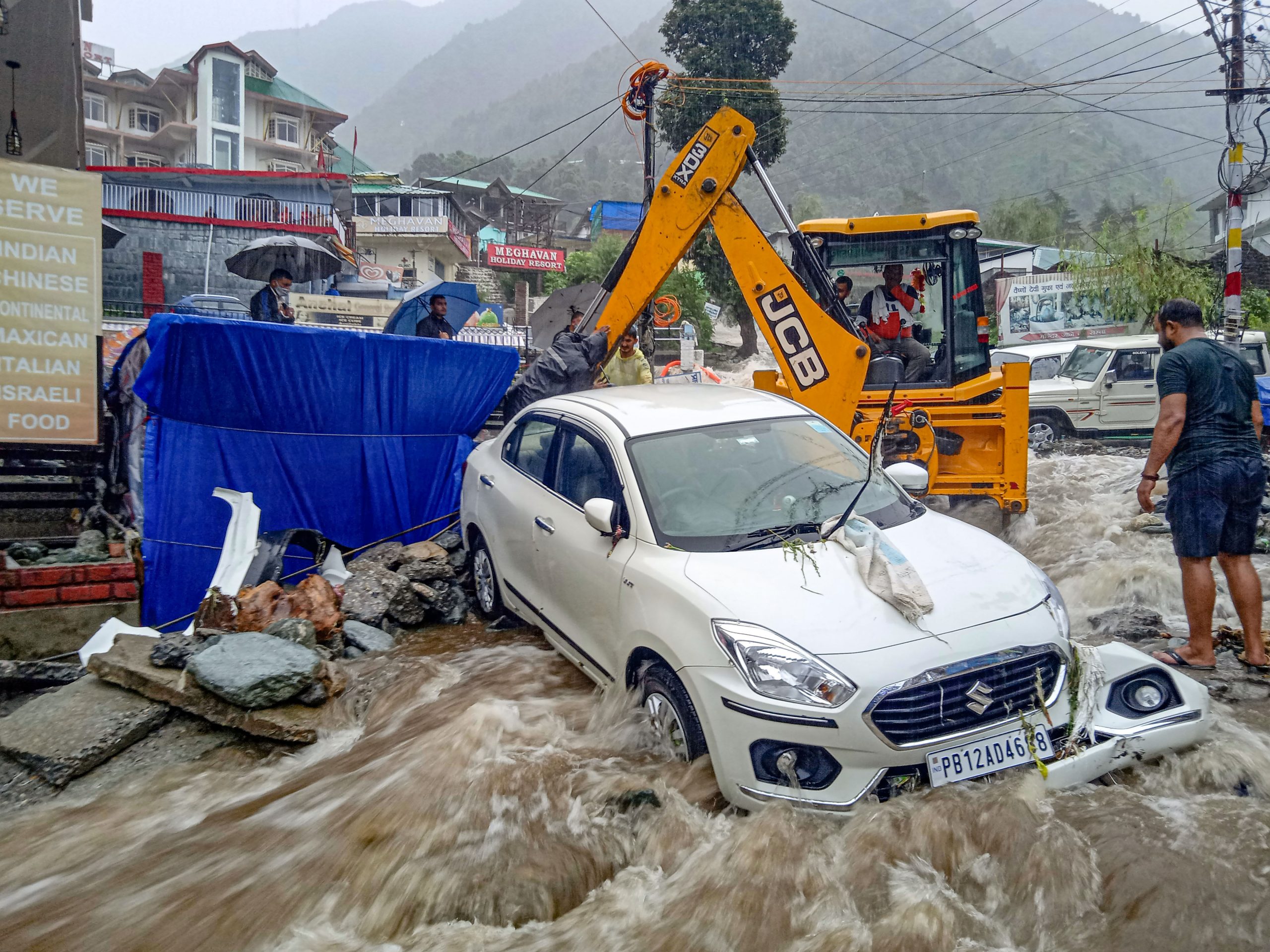 Lightning, flash floods lash north India; 52 dead, vehicles, bridge washed away