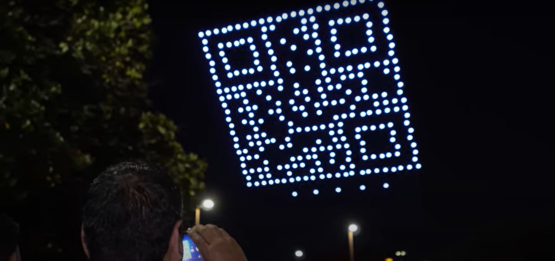 Watch: Giant QR code of 300 drones lights up night sky in Dallas