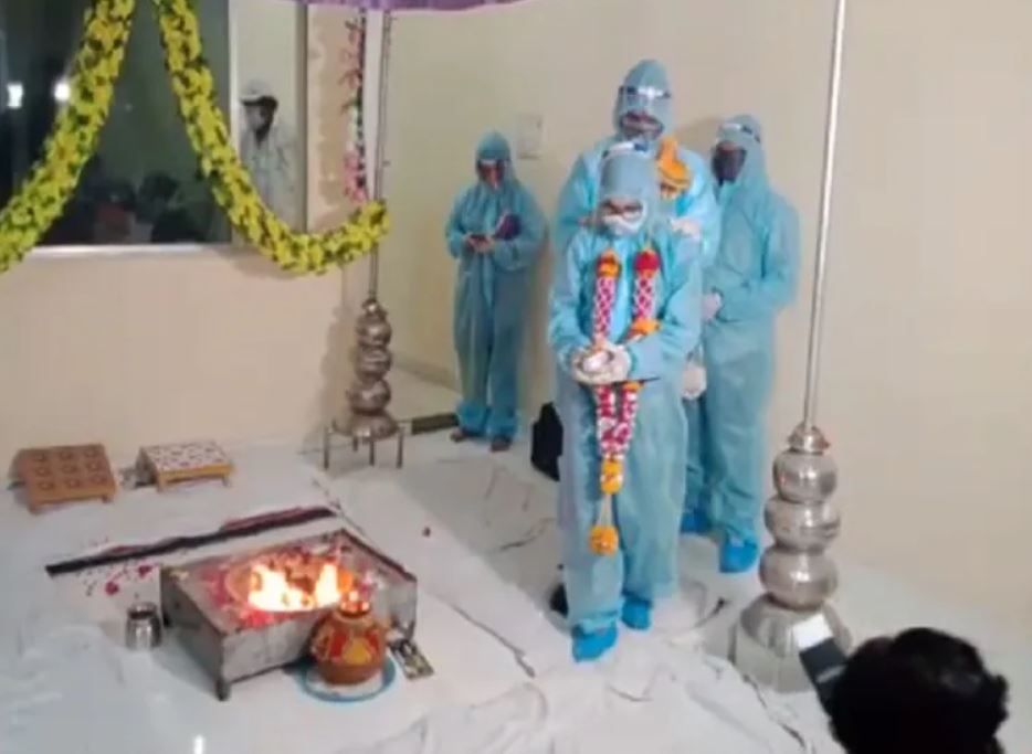 Wedding in COVID times: ‘Saat Pheras’ in PPE kit land this couple in trouble