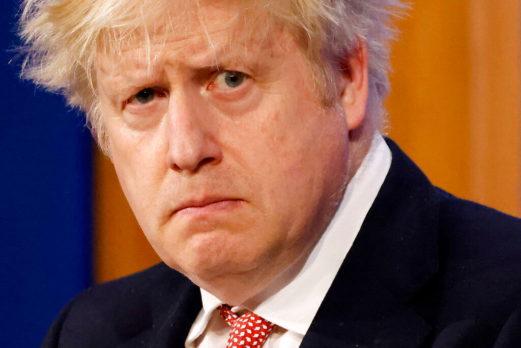 British PM Boris Johnson vows to stay in office after top ministers quit