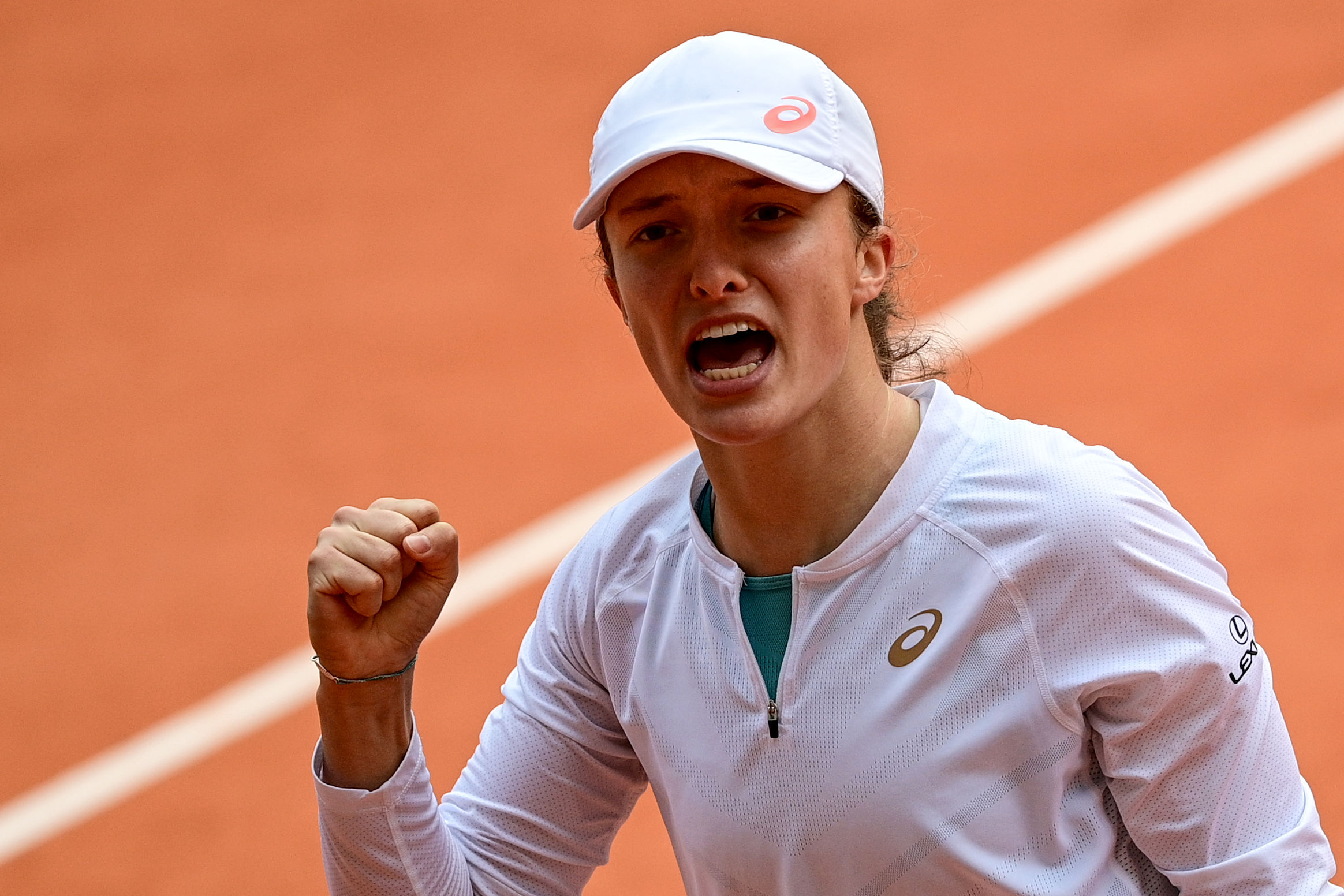 Iga Swiatek wins French Open to become Poland’s first Grand Slam singles champion