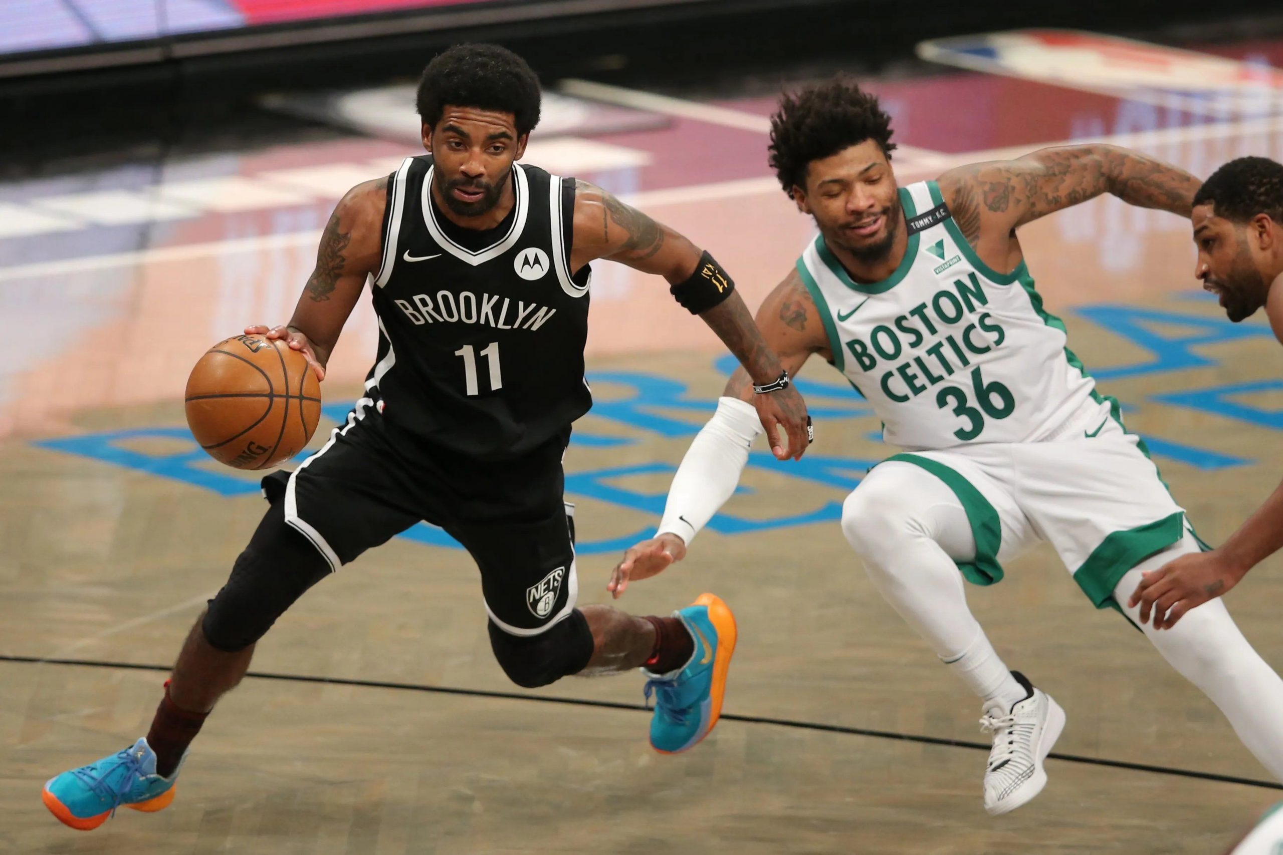 Nets hold on to edge Celtics and regain first place in East
