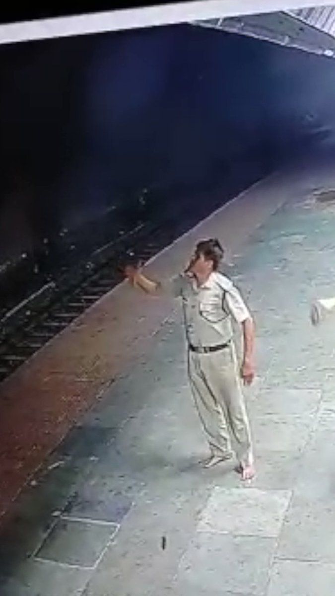 RPF constable saves woman from getting run over by train | Watch