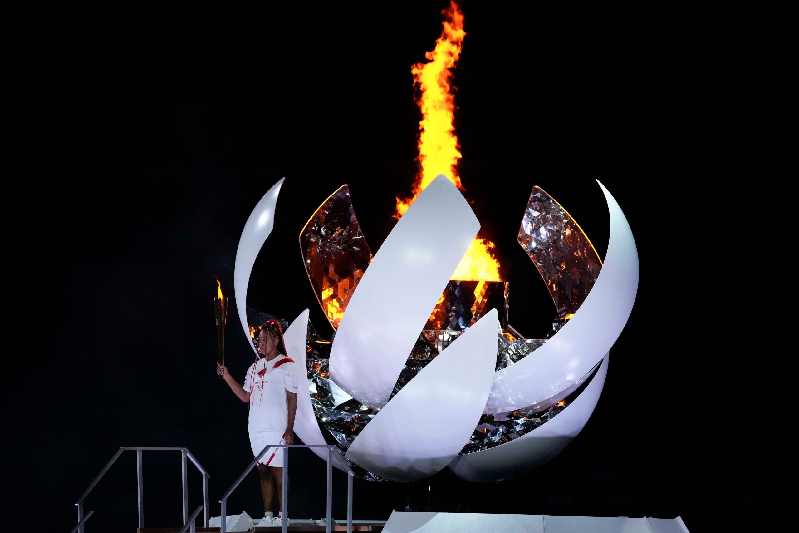 Tennis star Naomi Osaka lights Tokyo Olympics cauldron as Games kick off