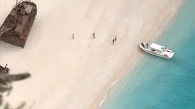 3 stranded sailors, who wrote SOS on sand, rescued from Micronesia island