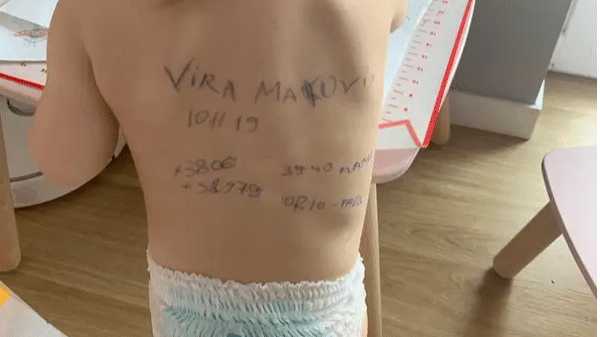 Ukrainian parents start writing on children’s bodies to protect them amid Russian invasion