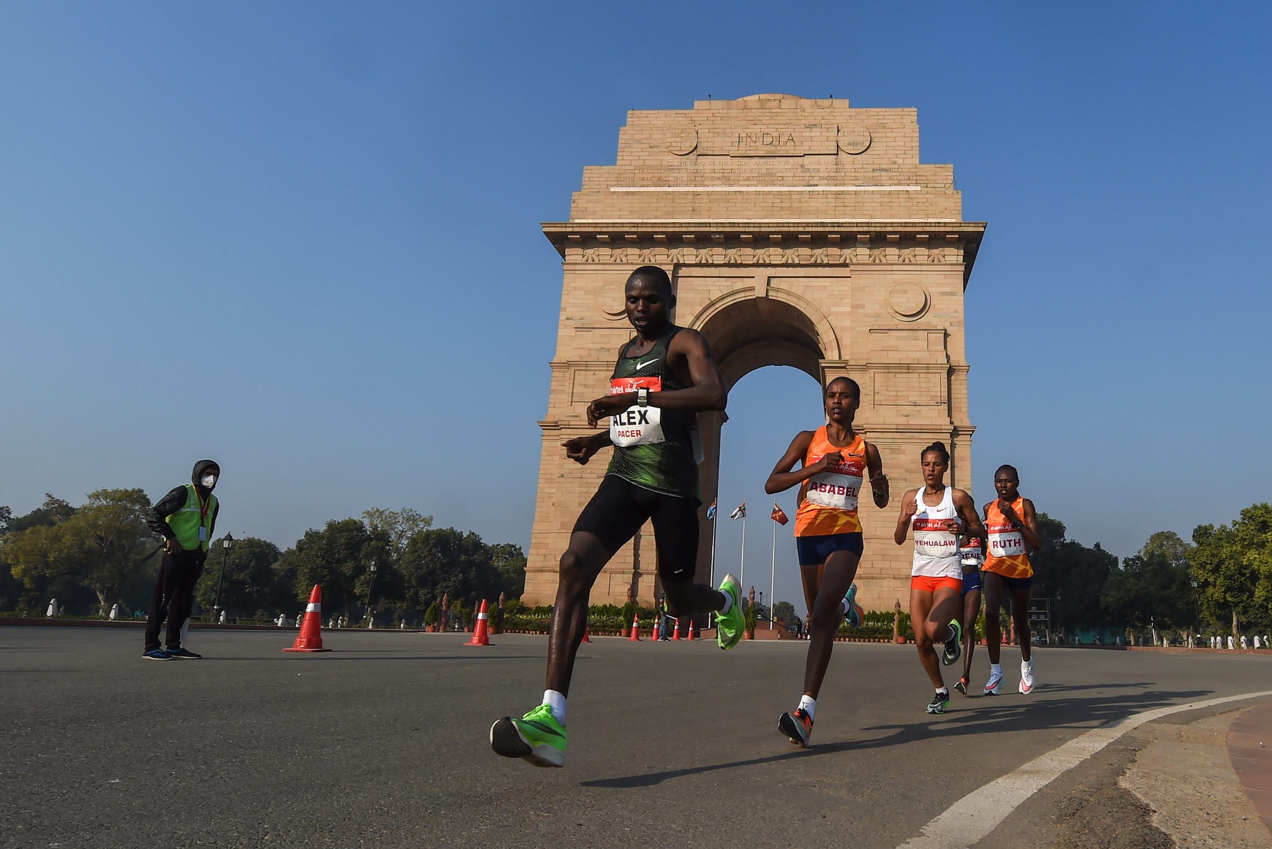 Top runners face COVID-19 pandemic, air pollution in Delhi half marathon