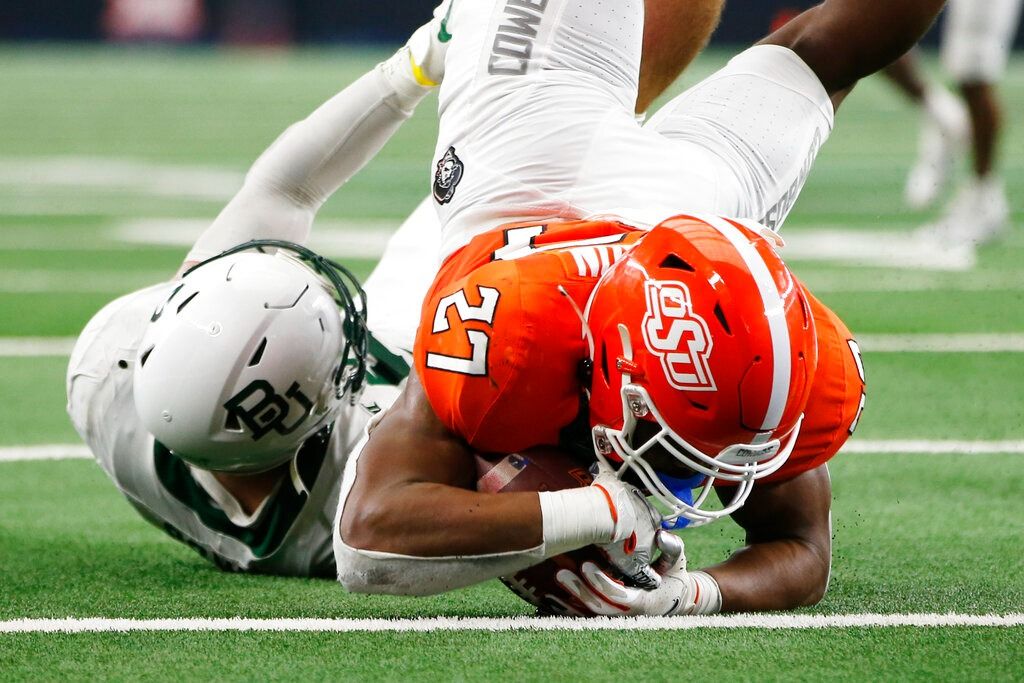NCAA: Baylor holds on for Big 12 title, knocks Okla St out of CFP