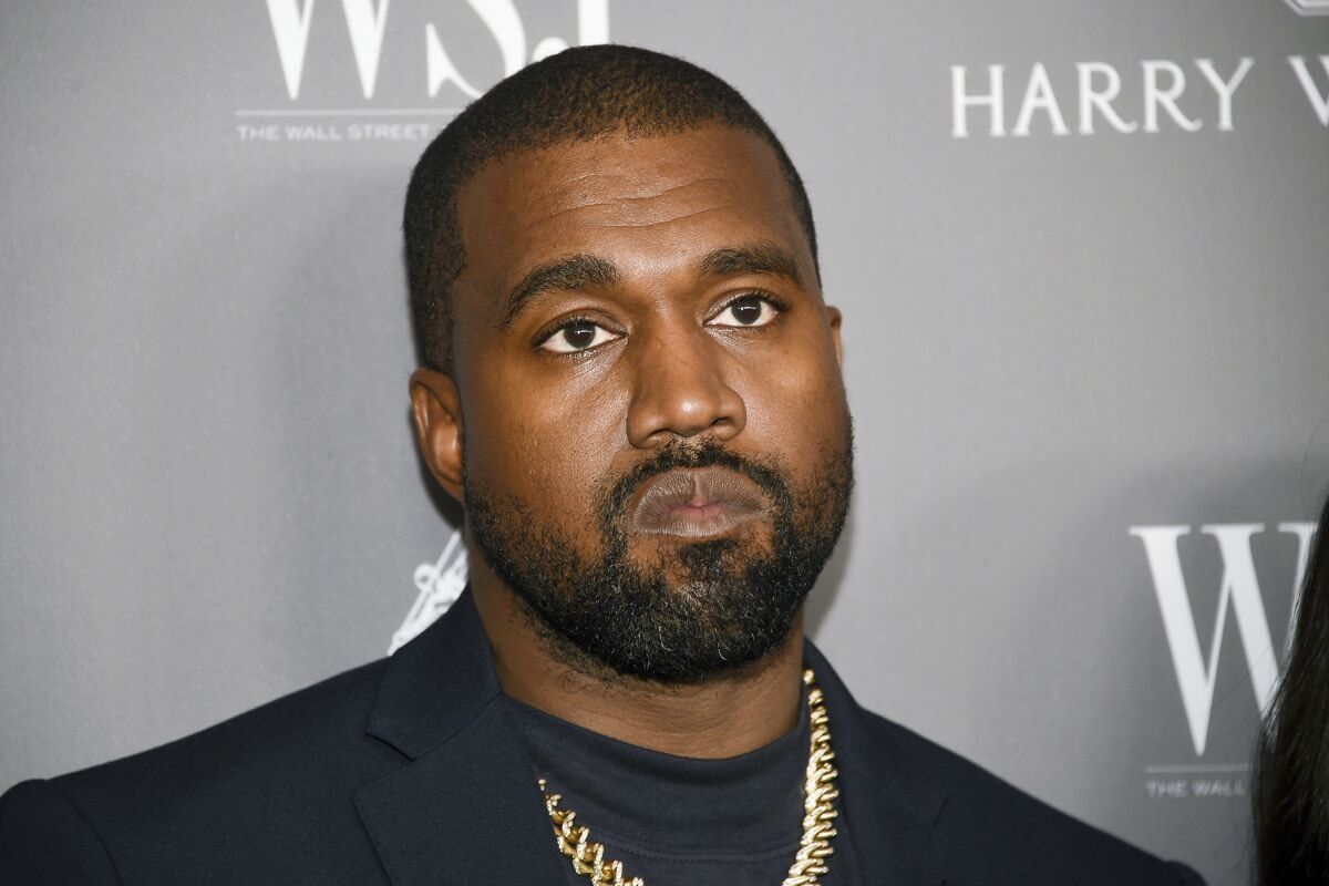 Kanye West suspended from Twitter after posting Hakenkreuz interlaced with Star of David