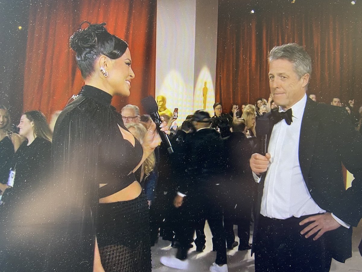 Hugh Grant trolled for ‘painful’ Oscars 2023 red carpet interview with Ashley Graham