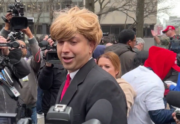 Donald Trump impersonator stirs up press outside Manhattan court before ex-president’s arrival