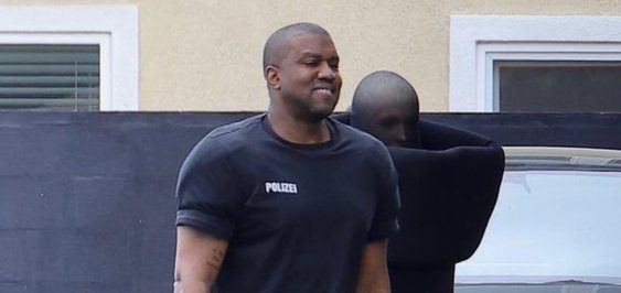 Kanye West yells at Papparazi as the rapper goes to church with wife and son