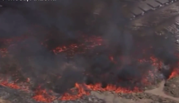 Fire in Mesa, Arizona causes flaming tornados, as firefighters fight massive mulch blaze