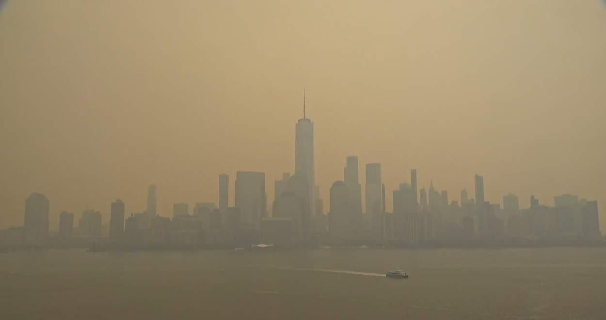 World Trade Center live cam shows before and after scenes of Canadian wildfire orange smoke covering New York skyline: Watch video