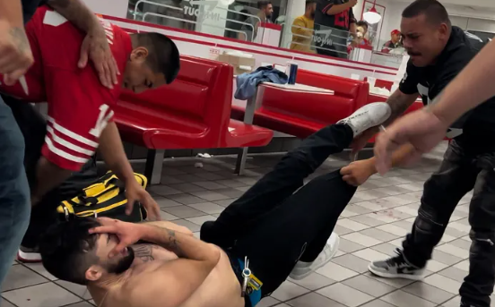 San Francisco 49ers and Las Vegas Raiders fans brawl at In-N-Out Burger, 2 people get stabbed | Video