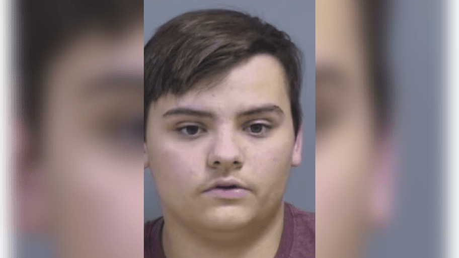 Who is Michael Bowden? 18-year-old arrested for posting a photo of himself with a hunting rifle in a Walmart parking lot