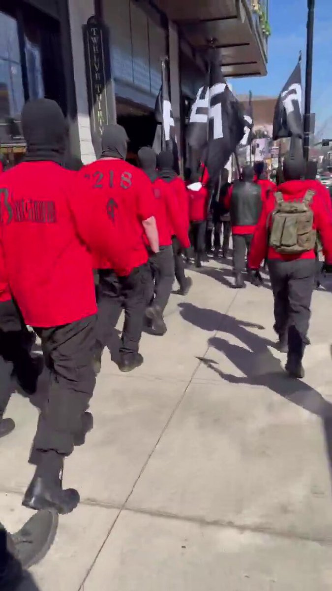 Neo-nazi group Blood Tribe spotted marching on the streets carrying Swastika flags in Nashville, Tennessee| Watch Video